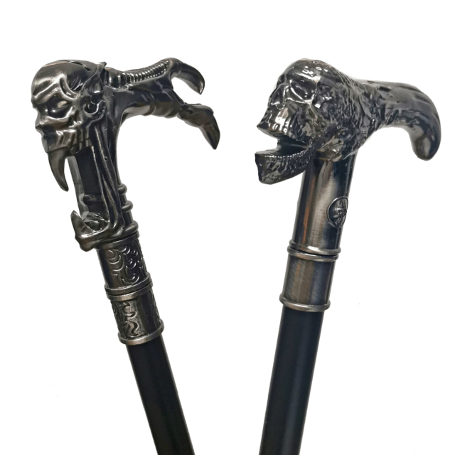 Gothic walking cane with handle in demonic dark style. The curved handle is available either in the shape of a demon skull or a slightly more classic skull.